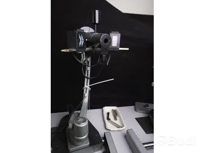 Optiker utrustning, undersökningsbord. Spaltlampa Haag-Streit 900.